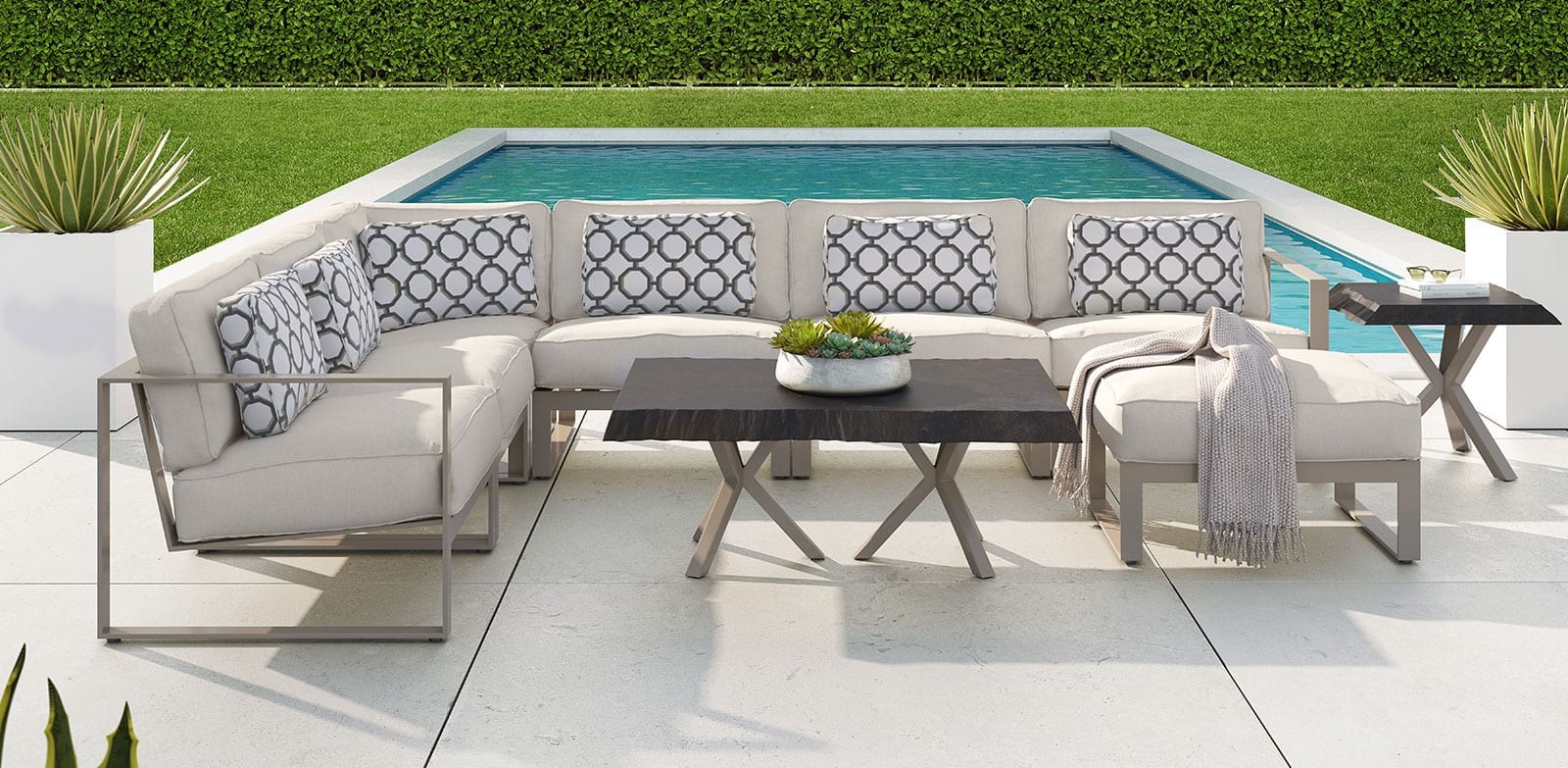 Park Place Sectional patio furniture set from Castelle on patio in front of pool