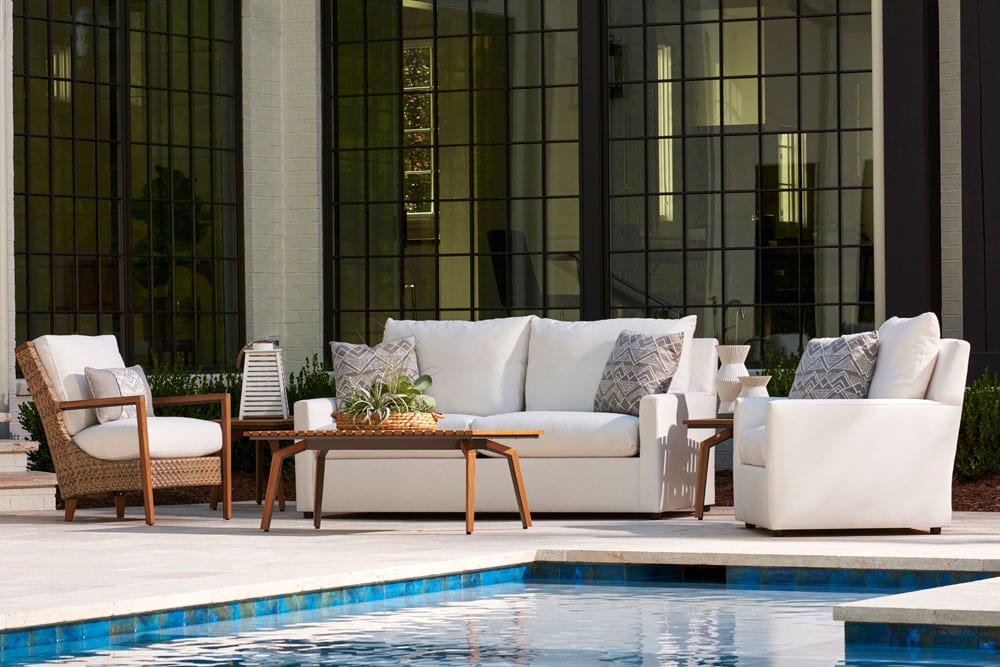 Edgewater outdoor furniture set from Lane Venture set up facing the pool
