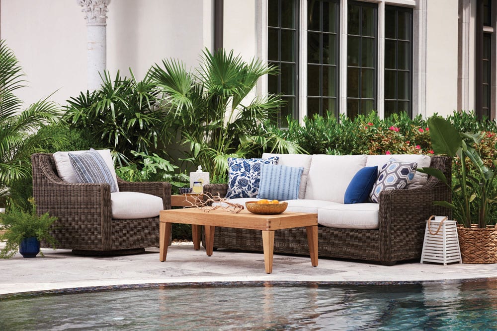 Oasis outdoor furniture set from Lane Venture on the patio facing the pool