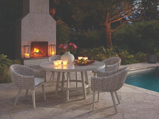 outdoor dining room set by outdoor fire