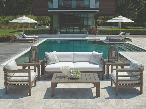 outdoor furniture set by the pool
